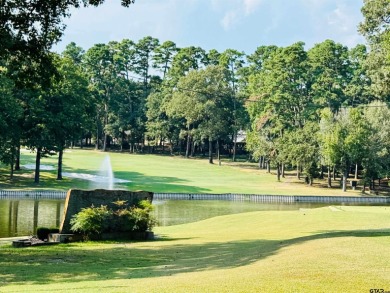 Nestled among the towering pines of East Texas, this beautifully on Holly Lake Ranch Golf Club in Texas - for sale on GolfHomes.com, golf home, golf lot