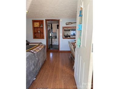 Cute, spacious 2 bedroom, 1 bath unit with lots of sleeping on The Tillery Tradition Country Club in North Carolina - for sale on GolfHomes.com, golf home, golf lot