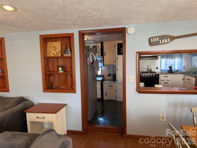 Cute, spacious 2 bedroom, 1 bath unit with lots of sleeping on The Tillery Tradition Country Club in North Carolina - for sale on GolfHomes.com, golf home, golf lot