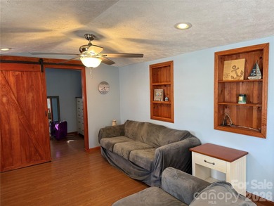 Cute, spacious 2 bedroom, 1 bath unit with lots of sleeping on The Tillery Tradition Country Club in North Carolina - for sale on GolfHomes.com, golf home, golf lot