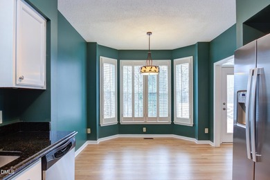 Brick-front home overlooking the 18th tee at Hedingham Golf Club on Hedingham Golf and Athletic Club in North Carolina - for sale on GolfHomes.com, golf home, golf lot