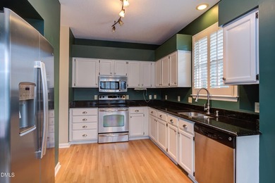 Brick-front home overlooking the 18th tee at Hedingham Golf Club on Hedingham Golf and Athletic Club in North Carolina - for sale on GolfHomes.com, golf home, golf lot