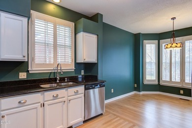 Brick-front home overlooking the 18th tee at Hedingham Golf Club on Hedingham Golf and Athletic Club in North Carolina - for sale on GolfHomes.com, golf home, golf lot