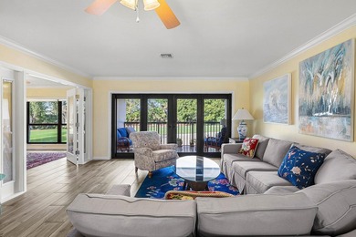 Spacious 3-bedroom, 2-bath condo featuring wood-look tile on Quail Ridge Golf Course and Country Club in Florida - for sale on GolfHomes.com, golf home, golf lot