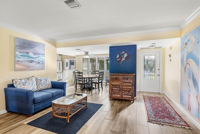 Spacious 3-bedroom, 2-bath condo featuring wood-look tile on Quail Ridge Golf Course and Country Club in Florida - for sale on GolfHomes.com, golf home, golf lot