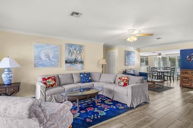 Spacious 3-bedroom, 2-bath condo featuring wood-look tile on Quail Ridge Golf Course and Country Club in Florida - for sale on GolfHomes.com, golf home, golf lot