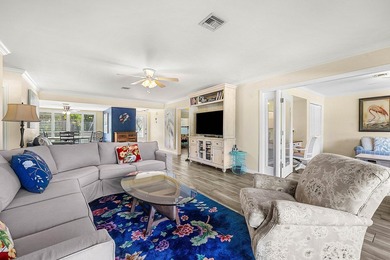 Spacious 3-bedroom, 2-bath condo featuring wood-look tile on Quail Ridge Golf Course and Country Club in Florida - for sale on GolfHomes.com, golf home, golf lot