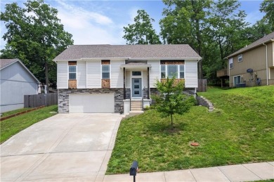 Welcome Home! This stunning contemporary home sits just outside on Loch Lloyd Country Club in Missouri - for sale on GolfHomes.com, golf home, golf lot