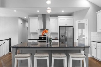 Welcome Home! This stunning contemporary home sits just outside on Loch Lloyd Country Club in Missouri - for sale on GolfHomes.com, golf home, golf lot