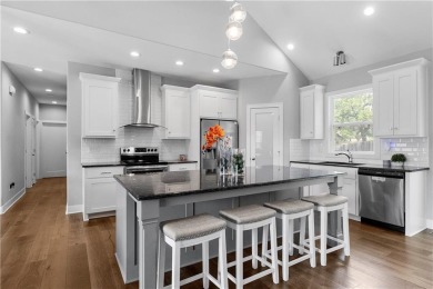 Welcome Home! This stunning contemporary home sits just outside on Loch Lloyd Country Club in Missouri - for sale on GolfHomes.com, golf home, golf lot