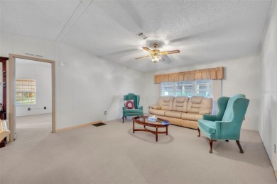 55+ Community!!! Move in Ready with lots of storage. Located in on Sweetwater Golf and Tennis Club in Florida - for sale on GolfHomes.com, golf home, golf lot