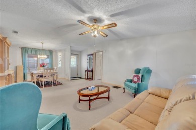 55+ Community!!! Move in Ready with lots of storage. Located in on Sweetwater Golf and Tennis Club in Florida - for sale on GolfHomes.com, golf home, golf lot