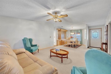 55+ Community!!! Move in Ready with lots of storage. Located in on Sweetwater Golf and Tennis Club in Florida - for sale on GolfHomes.com, golf home, golf lot