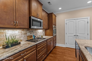 Welcome to the charming coastal town of Leland, NC. Take on Compass Pointe Golf Course in North Carolina - for sale on GolfHomes.com, golf home, golf lot