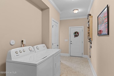 Welcome to the charming coastal town of Leland, NC. Take on Compass Pointe Golf Course in North Carolina - for sale on GolfHomes.com, golf home, golf lot