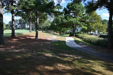 Located in the Signature Village of Bay Creek and fronting on on Bay Creek Golf Club in Virginia - for sale on GolfHomes.com, golf home, golf lot