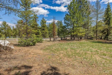 Level building lot bordering Tamarack land with direct access to on Osprey Meadows at Tamarack Resort in Idaho - for sale on GolfHomes.com, golf home, golf lot