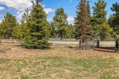 Level building lot bordering Tamarack land with direct access to on Osprey Meadows at Tamarack Resort in Idaho - for sale on GolfHomes.com, golf home, golf lot