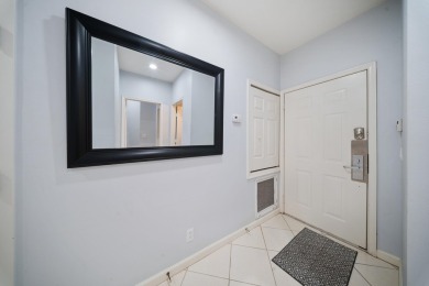 Bottom floor unit 2 bedroom and 2.5 bath located in Castle Pines on The Legacy Golf and Tennis Club in Florida - for sale on GolfHomes.com, golf home, golf lot