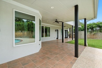 Tucked inside the gates of the prestigious Pecan Plantation golf on Pecan Plantation Country Club in Texas - for sale on GolfHomes.com, golf home, golf lot