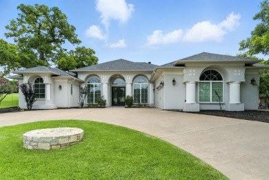 Tucked inside the gates of the prestigious Pecan Plantation golf on Pecan Plantation Country Club in Texas - for sale on GolfHomes.com, golf home, golf lot