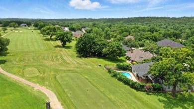 Tucked inside the gates of the prestigious Pecan Plantation golf on Pecan Plantation Country Club in Texas - for sale on GolfHomes.com, golf home, golf lot