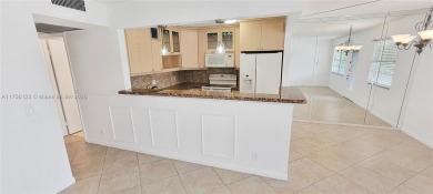 Step into this beautifully updated 2-bedroom, 1.5-bath condo in on Flamingo Lakes Country Club in Florida - for sale on GolfHomes.com, golf home, golf lot