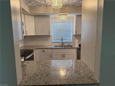 This spacious first-floor condo offers 2 bedrooms and 2 full on Hibiscus Golf Club in Florida - for sale on GolfHomes.com, golf home, golf lot