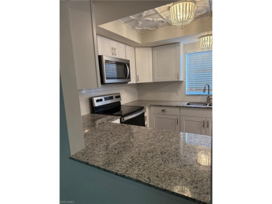 This spacious first-floor condo offers 2 bedrooms and 2 full on Hibiscus Golf Club in Florida - for sale on GolfHomes.com, golf home, golf lot
