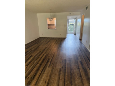 This spacious first-floor condo offers 2 bedrooms and 2 full on Hibiscus Golf Club in Florida - for sale on GolfHomes.com, golf home, golf lot