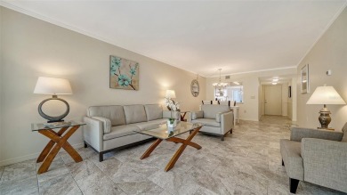 Ground-floor two-bedroom, two-bath condominium in a prime on The Meadows Golf and Country Club in Florida - for sale on GolfHomes.com, golf home, golf lot