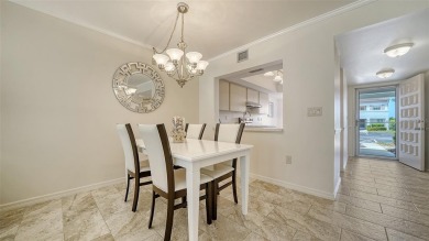 Ground-floor two-bedroom, two-bath condominium in a prime on The Meadows Golf and Country Club in Florida - for sale on GolfHomes.com, golf home, golf lot