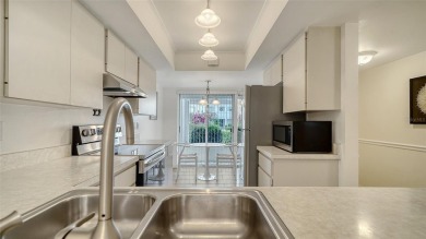 Ground-floor two-bedroom, two-bath condominium in a prime on The Meadows Golf and Country Club in Florida - for sale on GolfHomes.com, golf home, golf lot