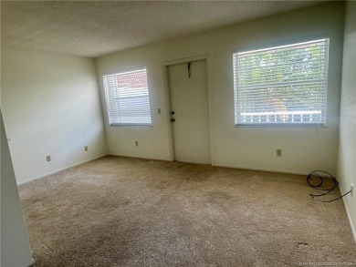 Enjoy the breeze on the screened lanai of this 1/1 2nd floor on Pine Lakes Golf Club in Florida - for sale on GolfHomes.com, golf home, golf lot