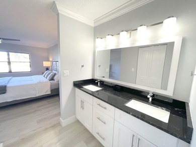 Completely Renovated 1ST Floor Unit at Eastpointe Country Club! on Eastpointe Country Club in Florida - for sale on GolfHomes.com, golf home, golf lot