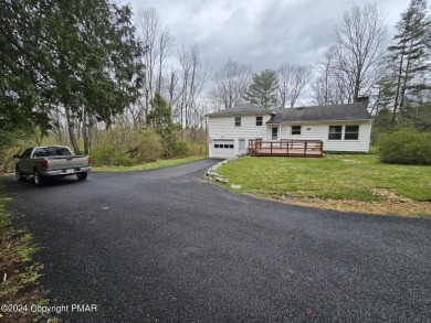 3-4 Bedroom Traditional SPLIT-LEVEL Home  W/1.5 Baths and Garage on Buck Hill Golf Club  in Pennsylvania - for sale on GolfHomes.com, golf home, golf lot