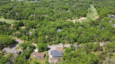 Welcome to your dream home! This stunning new build property on Lake Arrowhead Golf Course - The Pines in Wisconsin - for sale on GolfHomes.com, golf home, golf lot