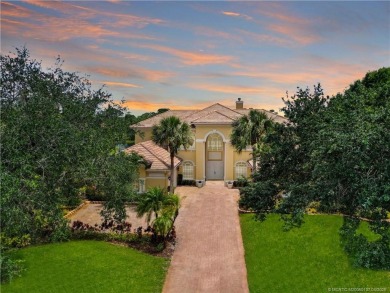 PRIVATE LAKESIDE RETREAT - This updated 5 BR, 6 bath, 4 garage on The Cape Club of Palm City in Florida - for sale on GolfHomes.com, golf home, golf lot