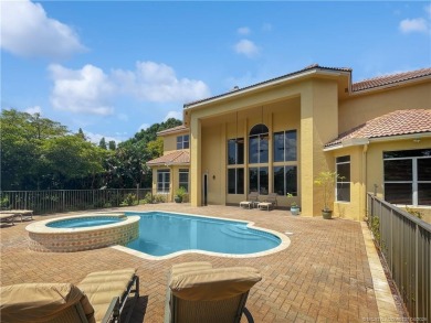 PRIVATE LAKESIDE RETREAT - This updated 5 BR, 6 bath, 4 garage on The Cape Club of Palm City in Florida - for sale on GolfHomes.com, golf home, golf lot