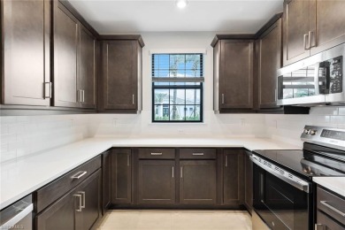 ****SIGNIFICANT PRICE IMPROVEMENT!*** JUST PACK YOUR PERSONAL on The Golf Club At Fiddlers Creek in Florida - for sale on GolfHomes.com, golf home, golf lot