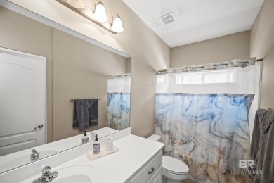 Welcome to this beautifully maintained 3-bedroom, 2-bath home on Peninsula Golf and Racquet Club in Alabama - for sale on GolfHomes.com, golf home, golf lot