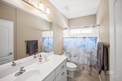 Welcome to this beautifully maintained 3-bedroom, 2-bath home on Peninsula Golf and Racquet Club in Alabama - for sale on GolfHomes.com, golf home, golf lot