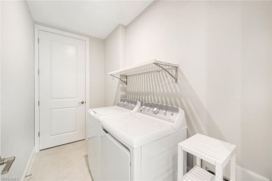 ****SIGNIFICANT PRICE IMPROVEMENT!*** JUST PACK YOUR PERSONAL on The Golf Club At Fiddlers Creek in Florida - for sale on GolfHomes.com, golf home, golf lot