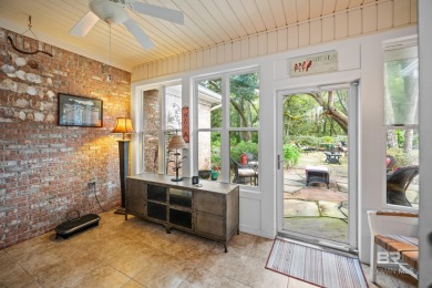 Welcome to this beautifully maintained 3-bedroom, 2-bath home on Peninsula Golf and Racquet Club in Alabama - for sale on GolfHomes.com, golf home, golf lot