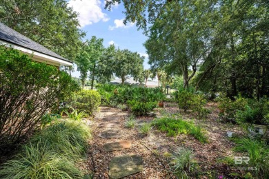 Welcome to this beautifully maintained 3-bedroom, 2-bath home on Peninsula Golf and Racquet Club in Alabama - for sale on GolfHomes.com, golf home, golf lot