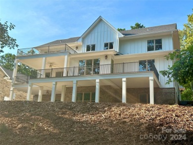 Stately new Lake Tillery home nestled in a quit cove in the on The Tillery Tradition Country Club in North Carolina - for sale on GolfHomes.com, golf home, golf lot