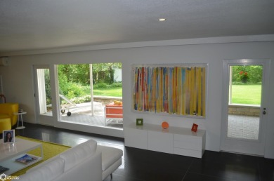 Luxuriously renovated mid-century modern home, open floor plan on Ottumwa Country Club in Iowa - for sale on GolfHomes.com, golf home, golf lot