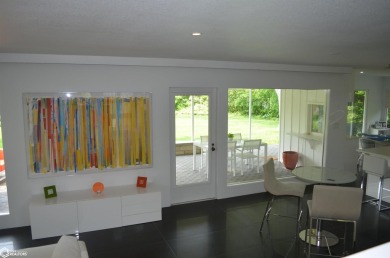 Luxuriously renovated mid-century modern home, open floor plan on Ottumwa Country Club in Iowa - for sale on GolfHomes.com, golf home, golf lot