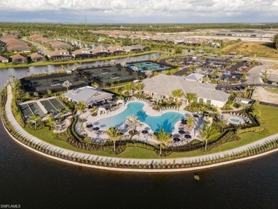 ****SIGNIFICANT PRICE IMPROVEMENT!*** JUST PACK YOUR PERSONAL on The Golf Club At Fiddlers Creek in Florida - for sale on GolfHomes.com, golf home, golf lot