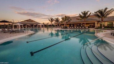 ****SIGNIFICANT PRICE IMPROVEMENT!*** JUST PACK YOUR PERSONAL on The Golf Club At Fiddlers Creek in Florida - for sale on GolfHomes.com, golf home, golf lot